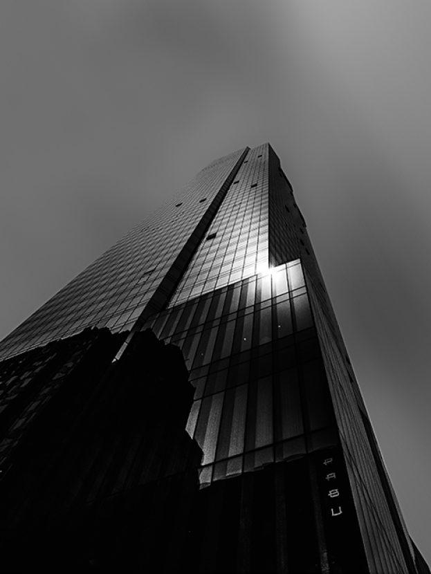 Beautiful low angle shot of a tall skyscraper Beautiful low angle shot of a tall skyscraper in black and white